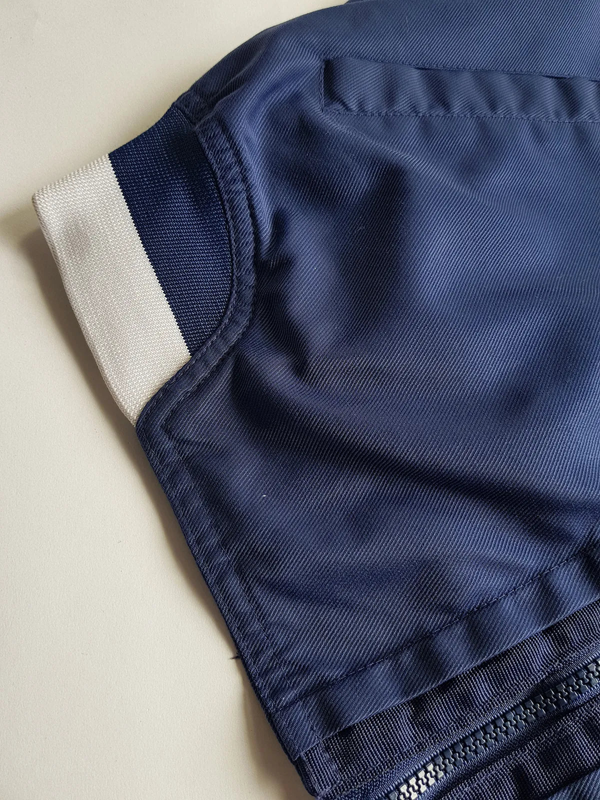 1990s Vintage Authentic Nike Workwear Vibes -  Bomber Style Track Jacket - Navy & Vintage White - Silver Hardware & Big Chunky Metal Zip - Embroidered Nike on the Chest - Elasticated Paneling on Neck Waist & Sleeves - Unworn Condition - Unisex Fit