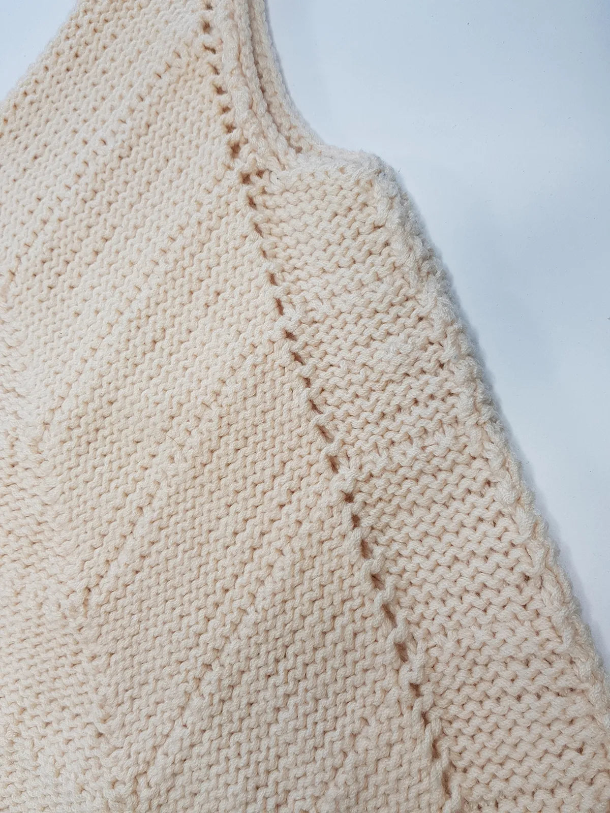 Rare 1970s handmade Knit Vest in Ivory - Hand knitted pure wool - V Neck & Hemline - Structured Waist - Perfect as a trans-seasonal piece worn over a flouncy shirt