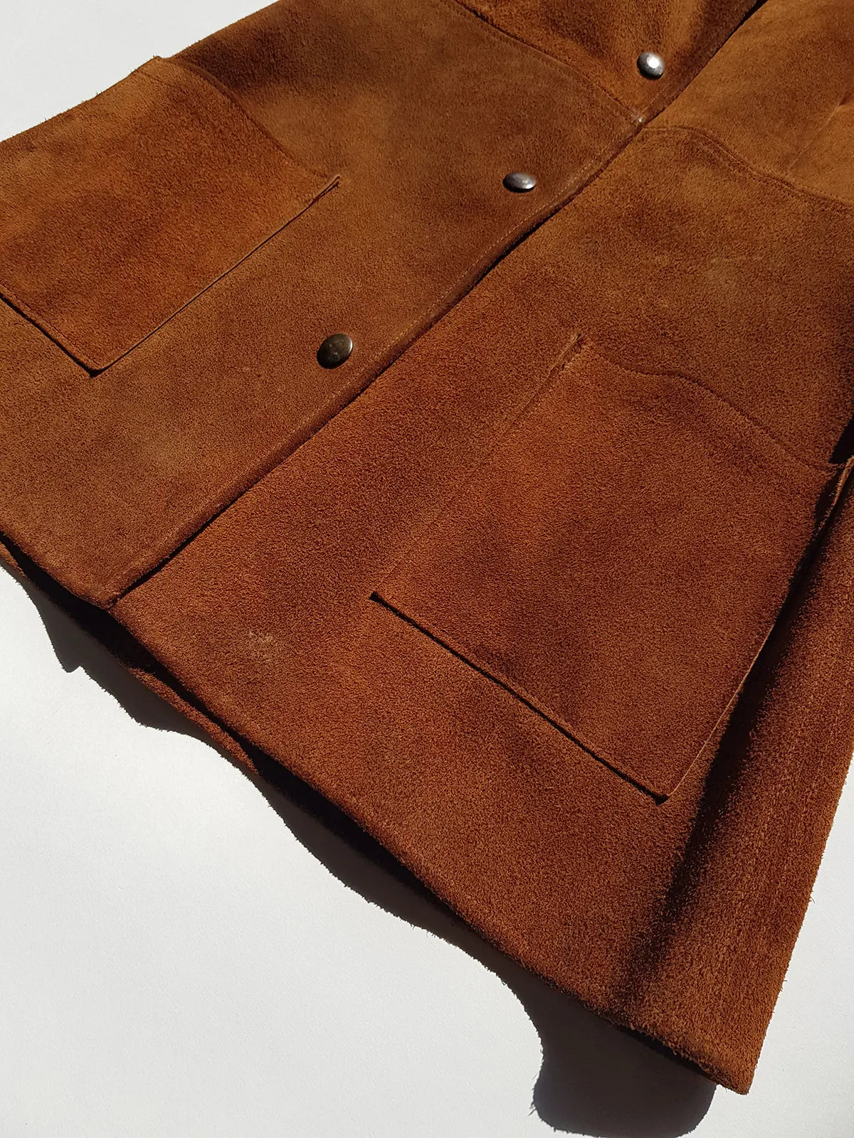 1970s genuine leather authentic vintage mini dress / vest in rich tobacco brown - metal pop buttons - belt loops - unbelievably cool