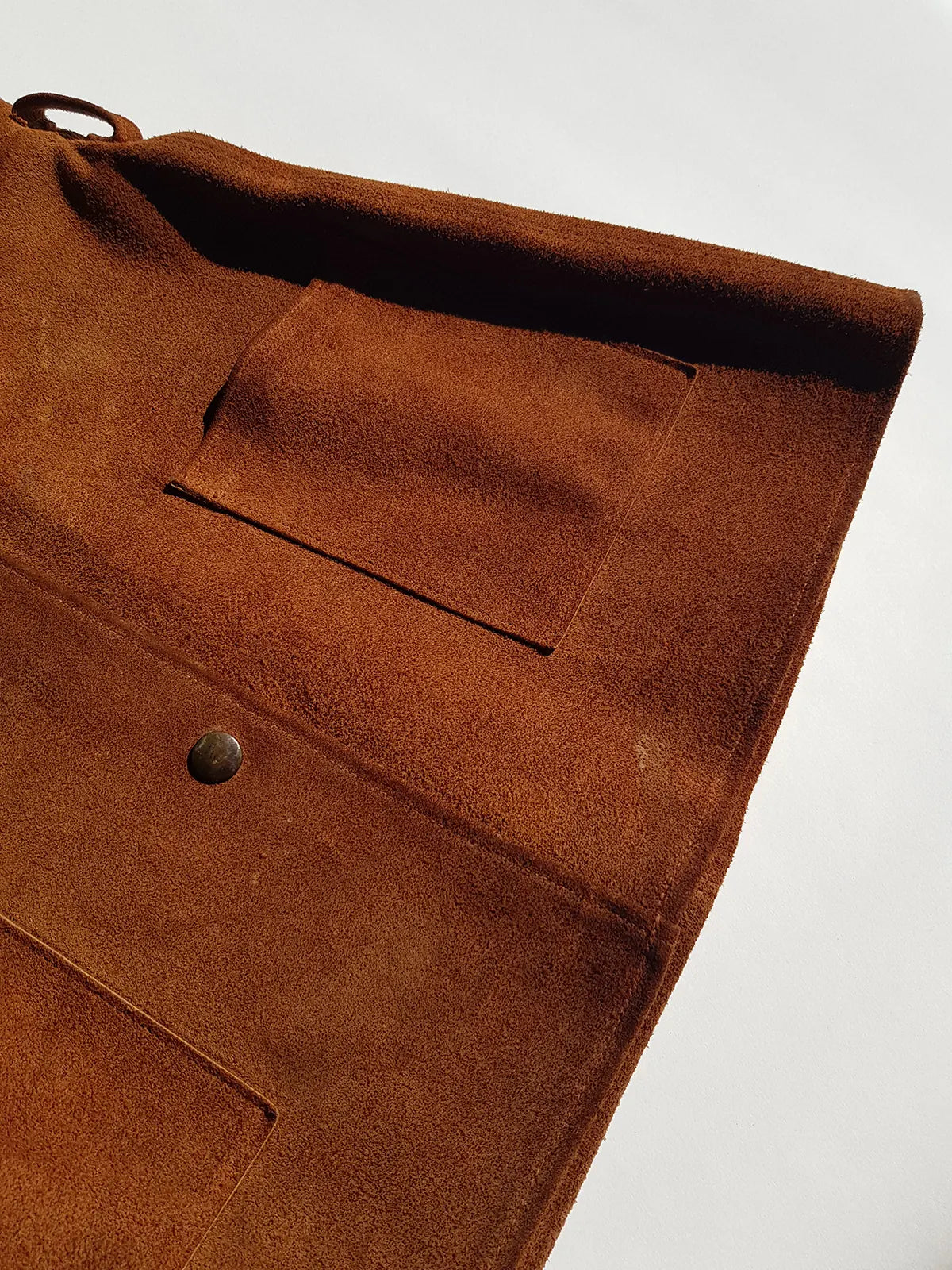 1970s genuine leather authentic vintage mini dress / vest in rich tobacco brown - metal pop buttons - belt loops - unbelievably cool