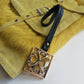 Christian LaCroix Designer Ornate Black Leather & Gold Hardware Bag charm with Signature CL Emblem & Stamp