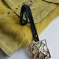 Christian LaCroix Designer Ornate Black Leather & Gold Hardware Bag charm with Signature CL Emblem & Stamp
