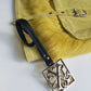 Christian LaCroix Designer Ornate Black Leather & Gold Hardware Bag charm with Signature CL Emblem & Stamp
