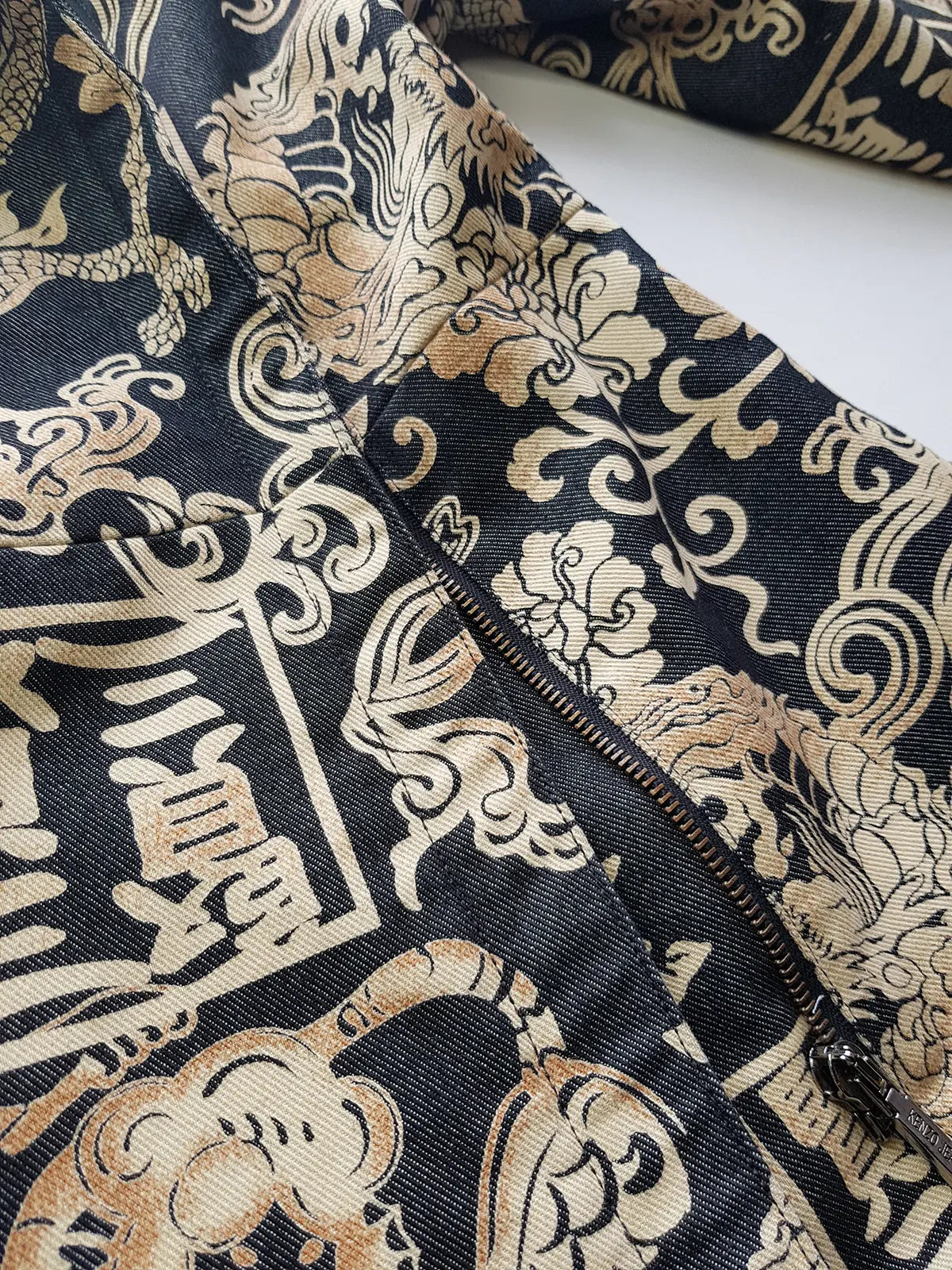 Rare 90s Kenzo France Dragon Denim Coat with Japanese Asian prints in 100% cotton - Made in Italy - Vegan Fur Collar - Fully Lined- Zip Front Closure - Dark Denim Blue with Taupe Gold Prints - Worn by Celebrities