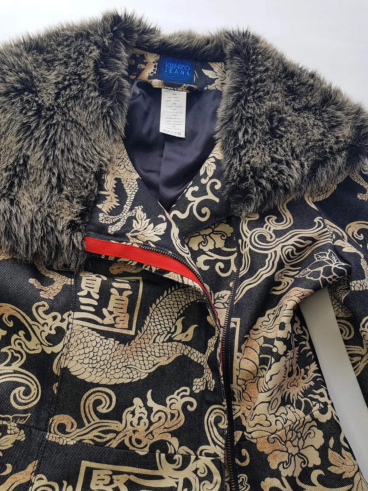 Rare 90s Kenzo France Dragon Denim Coat with Japanese Asian prints in 100% cotton - Made in Italy - Vegan Fur Collar - Fully Lined- Zip Front Closure - Dark Denim Blue with Taupe Gold Prints - Worn by Celebrities