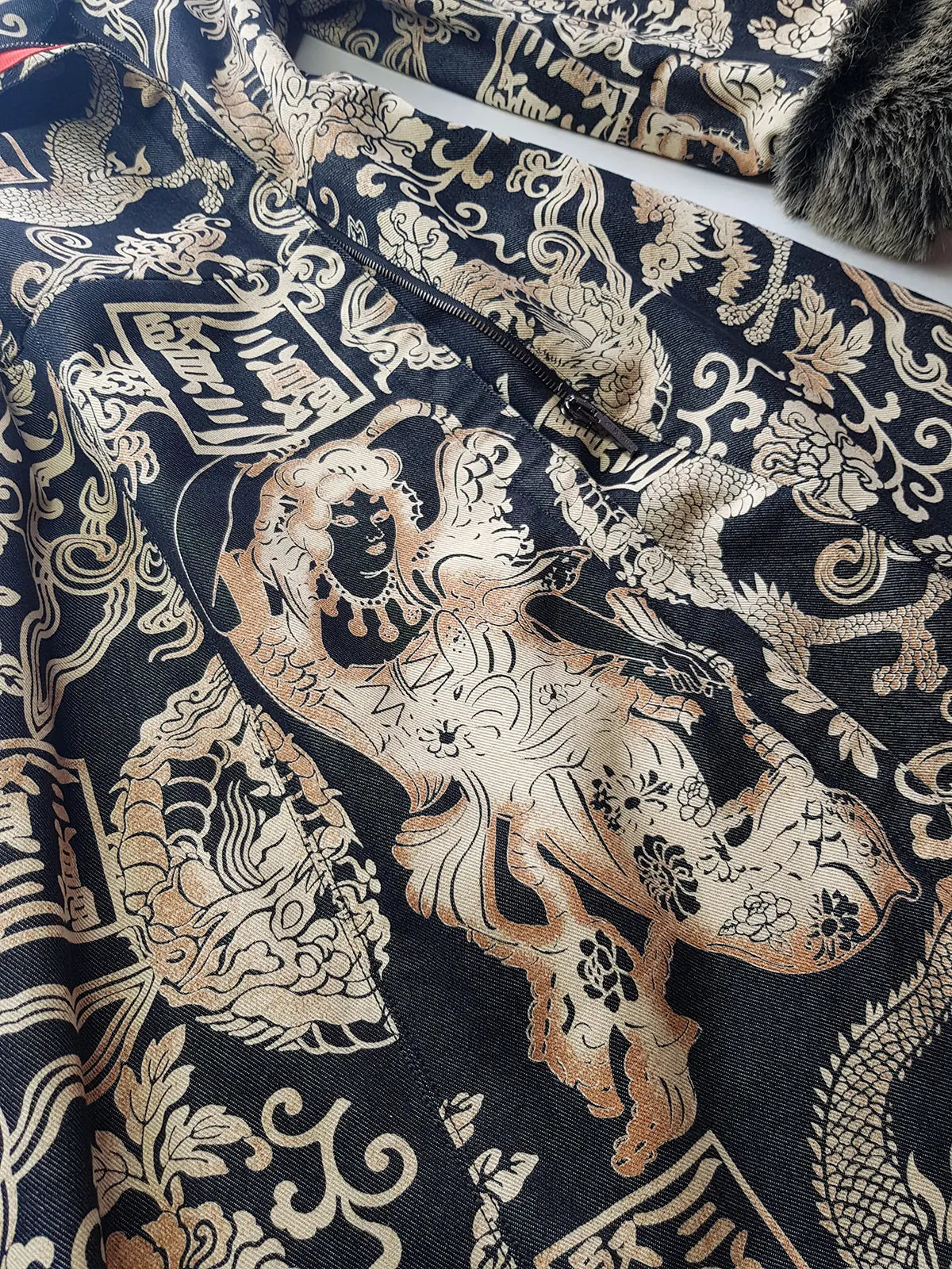 Rare 90s Kenzo France Dragon Denim Coat with Japanese Asian prints in 100% cotton - Made in Italy - Vegan Fur Collar - Fully Lined- Zip Front Closure - Dark Denim Blue with Taupe Gold Prints - Worn by Celebrities